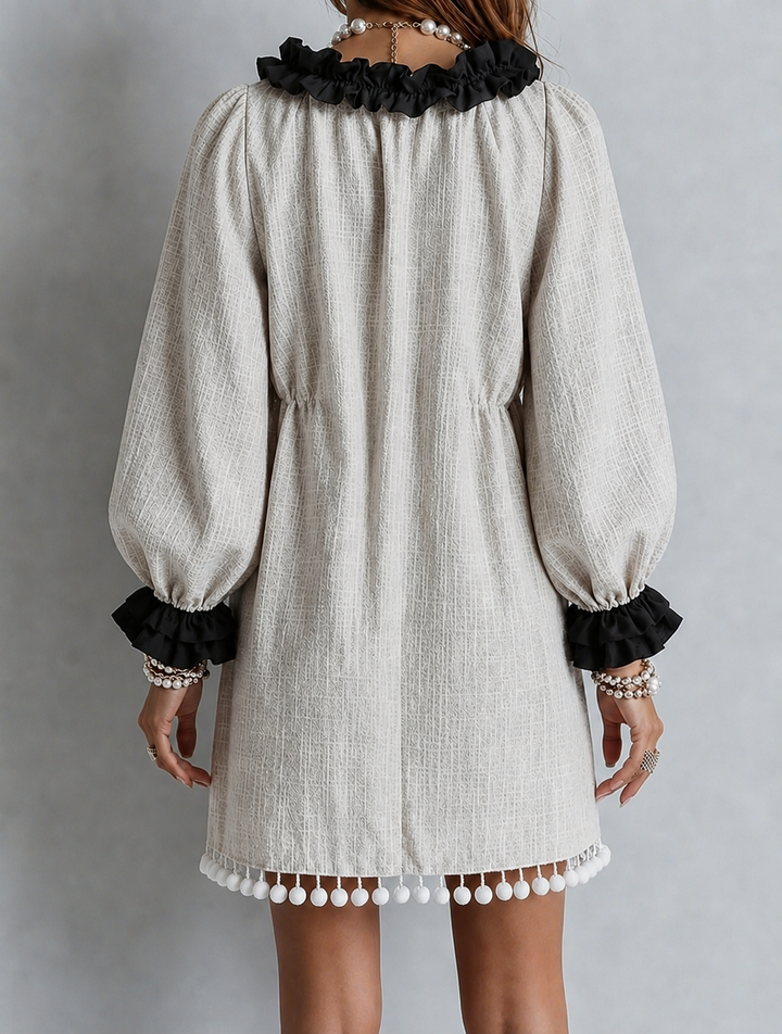 Aisha – Mini Dress with Puff Sleeves and Ruffle Detail